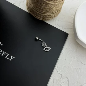 پیرسینگ ناف استیل طرح چشم زنانه