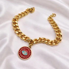 دستبند کارتیر استیل طرح «چشم‌نظر خورشیدی» | زنجیر کوبایی طلایی با پلاک میناکاری قرمز