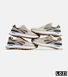 کفش کتانی قهوه ای کرم REEBOK Unphased Pro مدل 6371