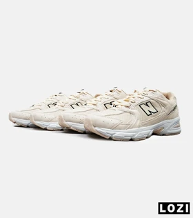 کفش کتانی مردانه و زنانه کرم NEW BALANCE 530