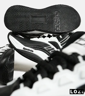 کفش کتانی ساق‌دار مشکی سفید Reebok Shaq Attaq