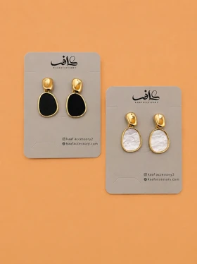 گوشواره صدفی دفرمه آویزدار
