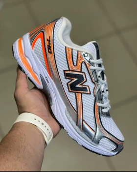 کفش کتانی نیوبالانس 740 سفید نارنجی new balance 740 white orange کد 263391
