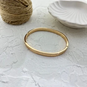 دستبند زنانه بنگل با طرح آینه‌ای و روکش طلایی