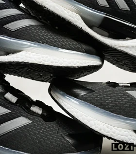 کفش کتانی مردانه و زنانه مشکی نوک مدادی ADIDAS Solar disk
