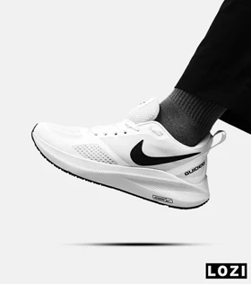 کفش کتانی بزرگ پا سفید مشکی Nike guide 10
