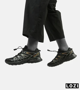 کفش کتانی مشکی طلایی مردانه و زنانه سالومون Salomon X ULTRA