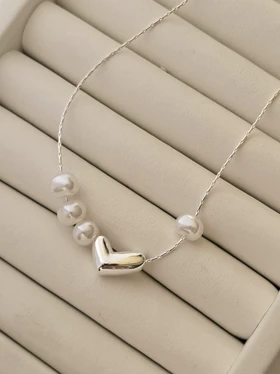 گردنبند قلب دفرمه مروارید دار