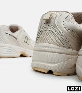 کفش کتانی مردانه و زنانه کرم NEW BALANCE 530