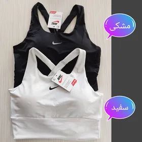 نیم‌تنه ورزشی زنانه پشت گره‌ای نایک