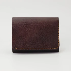 کیف پول و جاکارتی دور دوخت چرم مصنوعی (فوم) دکمه‌دار طراحی ساده کد 18195س