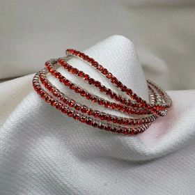 دستبند تنیسی تمام نگین مدل «قرمز آتشین» | تمام استیل (درخشش یاقوتی)