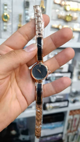 ساعت مچی زنانه موادو Movado موتور کوارتز باکیفیت و طراحی زیبا (مشکی)