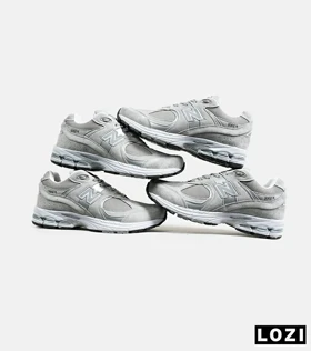 کفش کتانی طوسی NEW BALANCE 2002R