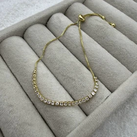 دستبند طلایی نگین‌دار کراواتی