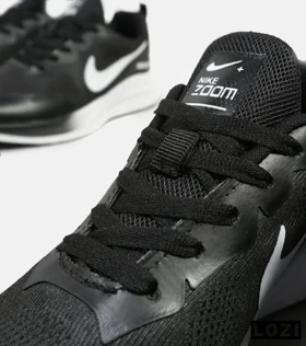 کفش کتانی بزرگ پا مشکی سفید Nike air zoom