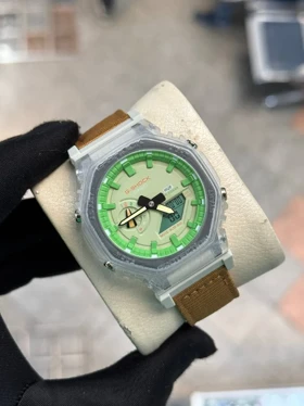 ساعت جی شاک2100بند برزنتی عسلی صفحه سبز
