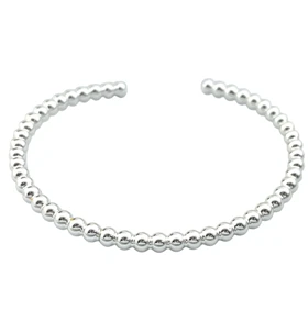 دستبند زنانه بنگل مدل اوربینا طرح گویهای نقرهای مینیمال