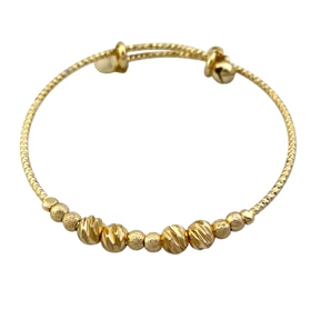 دستبند زنانه طرح طلا با گویهای برجسته برند ژوپینگ