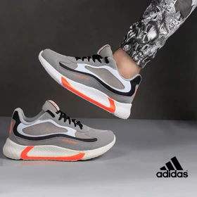 کفش مردانه adidasمدل ukabed( طوسی نارنجی)