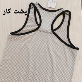 تاپ قهرمانی زنانه نایک راه راه ریز سایز 36 38