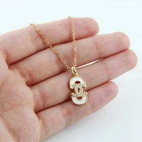 گردنبند دخترانه مدل چنل و دایره (طلایی)