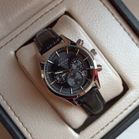 ساعت چرمی زنانه الگانس طرح سه موتور تقویم دار بند مشکی قاب سیلور