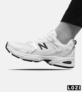 کفش کتانی مردانه و زنانه سفید نقره ای NEW BALANCE 530 مدل 5507