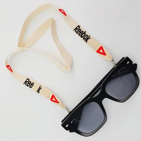 بند عینک پارچه ای طرحدار کد 90067س (بند استخوانی طرح Reebok (قرمز))