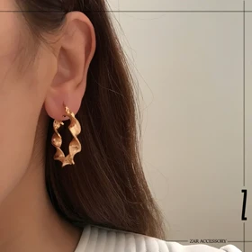 گوشواره زنانه حلقه‌ای فر تراش‌دار