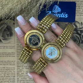 ساعت ورساچه طلایی زنانه صفحه سفید چرخان w-8784