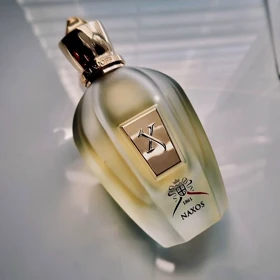 عطر NAXOS