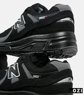 کفش کتانی بزرگ پا مشکی طوسی NEW BALANCE 2002R