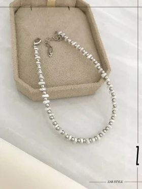 پابند گوی و مروارید