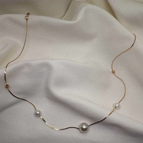 گردنبند ژوپینگ مدل "اشک فرشته" | ترکیب مروارید و گوی طلایی با درخشش ابدی