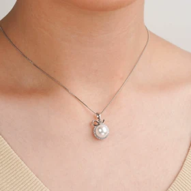 پلاک مروارید دور نگین رنگ سفید برند ژوپینگ