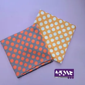 روسری کوتاه خال‌خالی نارنجی