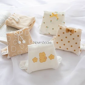 شورت خال‌خالی منگوله‌دار