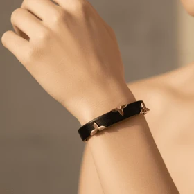 دستبند زنانه مدل گل سه پر