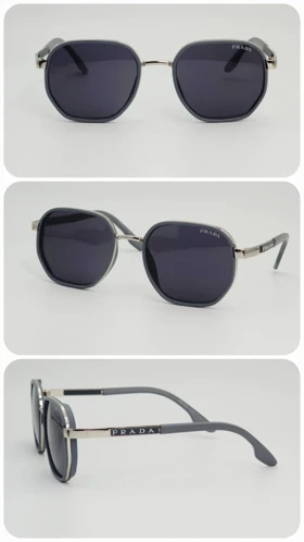 عینک آفتابی مردانه و زنانه پرادا Prada SPS111/S ضد اشعه UV400 ایتالیایی (فریم نقره‌ای طوسی عدسی‌ها مشکی)