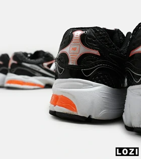کفش کتانی مردانه و زنانه مشکی نارنجی NEW BALANCE 1064