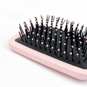 برس مو زنانه سیلیکونی مدل پارویی صورتی