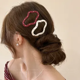 گیره ژورنالی خالدار چرم