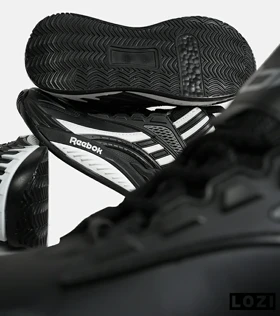 کفش کتانی ساق‌دار مشکی سفید Reebok Shaq Attaq