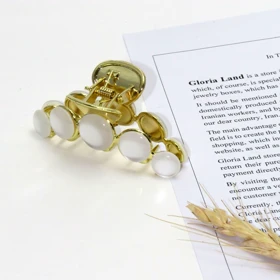 کلیپس مو زنانه مدل مرواریدی شفاف کد 1380