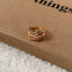 انگشتر طلایی با نماد بی‌نهایت