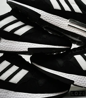 کفش کتانی مردانه مشکی سفید ADIDAS ZX 500