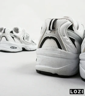 کفش کتانی مردانه و زنانه سفید نقره ای NEW BALANCE 530