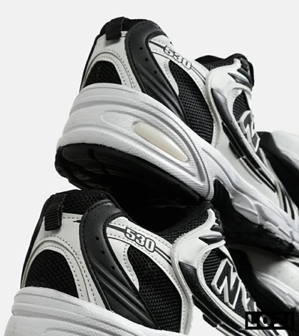کفش کتانی مردانه و زنانه سفید مشکی NEW BALANCE 530