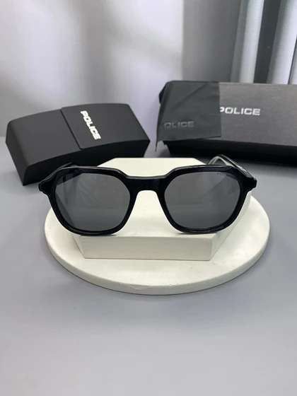 عینک آفتابی پلیس مدل XB2303 فریم مدرن با عدسی پلاریزه و محافظ UV400 مناسب استایل روزمره